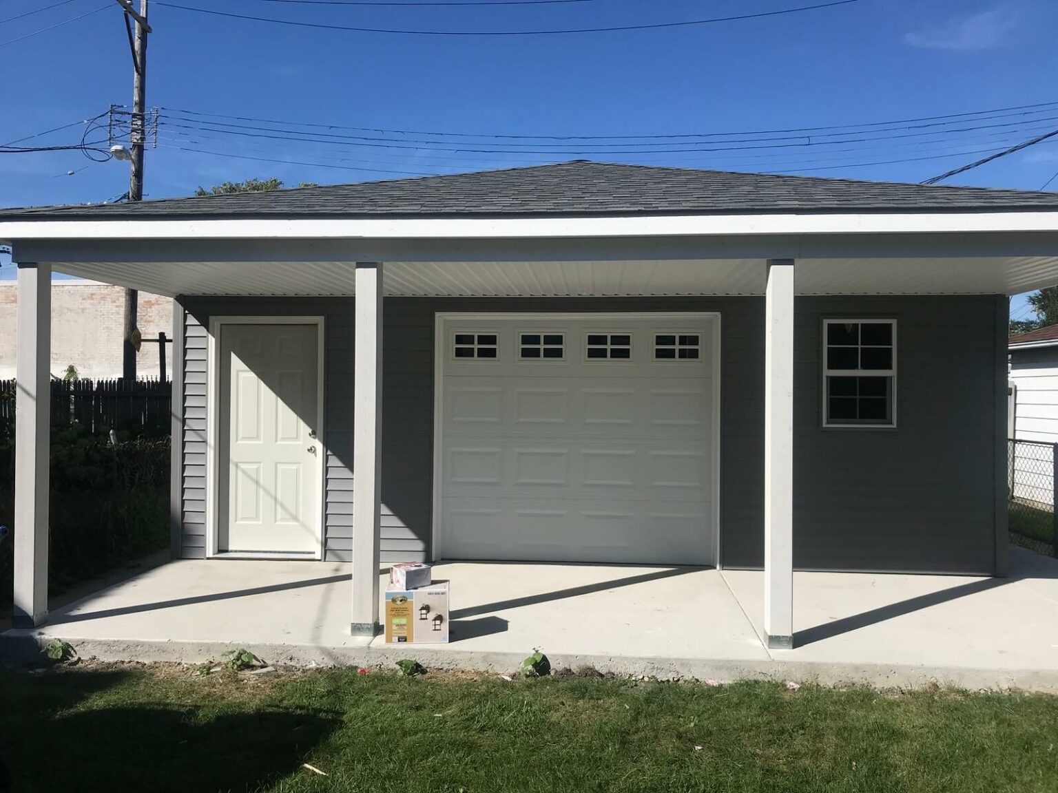 2_car_garage_hip_roof_patio3 Absolute Garage Builders