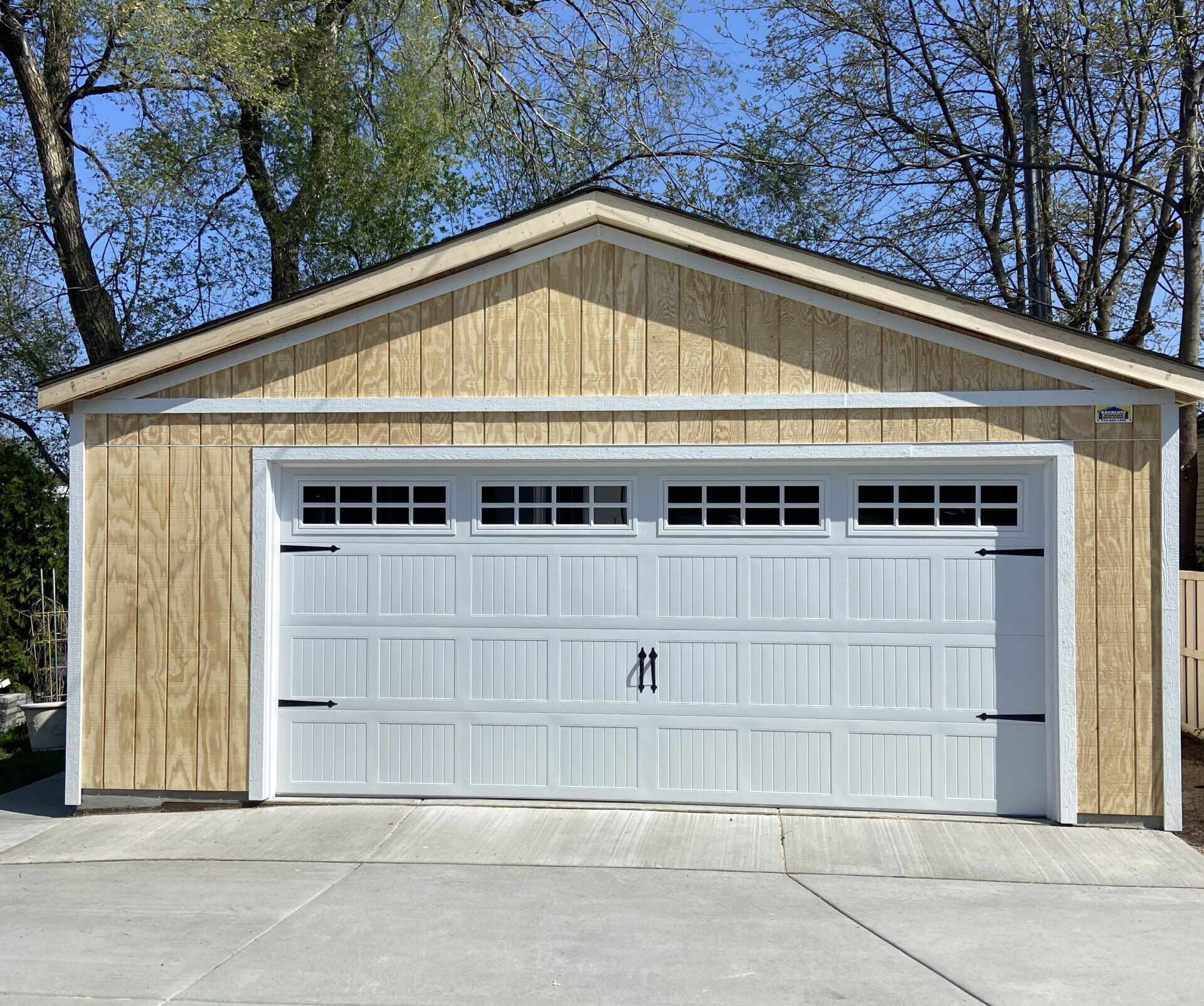 custom garage with white doors